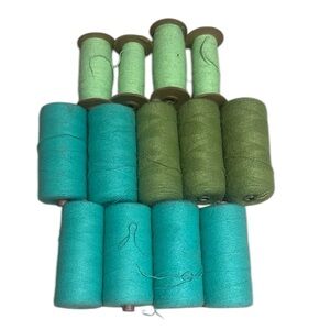 Assorted Green and Teal Yarn Spools
